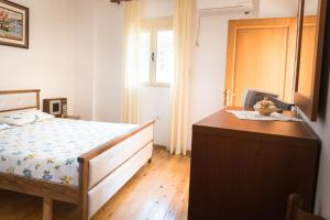 Cama o camas de una habitación en Iraklis Lykokas