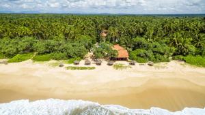 an aerial view of a resort on a tropical island at Good Karma in Tangalle