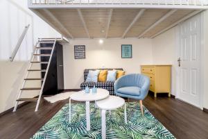 A seating area at BpR Turquoise Simplicity Apartment
