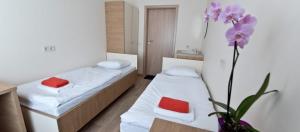 Postel nebo postele na pokoji v ubytování Bella Jūrmala Hotel