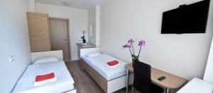 Postel nebo postele na pokoji v ubytování Bella Jūrmala Hotel