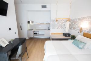 Posteľ alebo postele v izbe v ubytovaní Hotel Catalina
