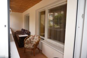 a room with a chair and a window at Karolina in Nida