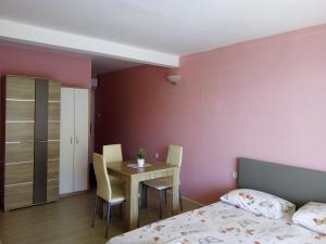 Postel nebo postele na pokoji v ubytování Apartments M&Z