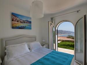 A bed or beds in a room at Le Villette - Taormina