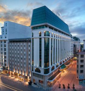 a large office building with a lot of windows at Elite World Istanbul Taksim in Istanbul