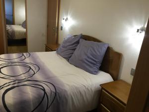 Postel nebo postele na pokoji v ubytování Vila do Rocha + 26 fotografií