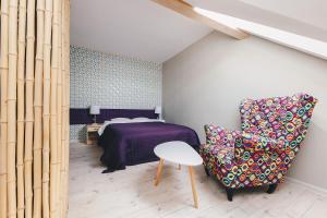 Postel nebo postele na pokoji v ubytování B&B Landrynka