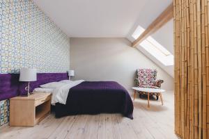 Postel nebo postele na pokoji v ubytování B&B Landrynka