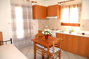 Kuchyňa alebo kuchynka v ubytovaní Ifigenia Apartments