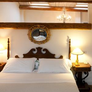 Кровать или кровати в номере M Club De Luxe B&B