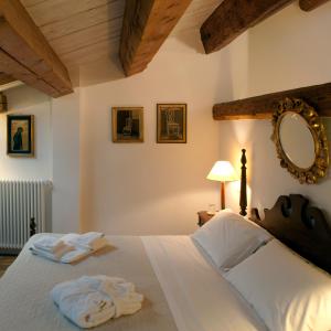 Кровать или кровати в номере M Club De Luxe B&B
