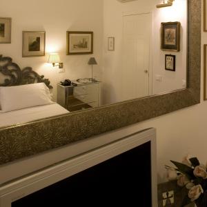 Кровать или кровати в номере M Club De Luxe B&B