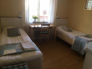 Voodi või voodid majutusasutuse Hotell Paradis toas