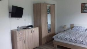 Posteľ alebo postele v izbe v ubytovaní Studio apartman Trdina