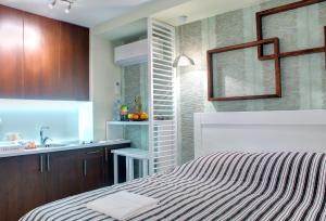 Luxury Studio Yasmine tesisinde bir odada yatak veya yataklar