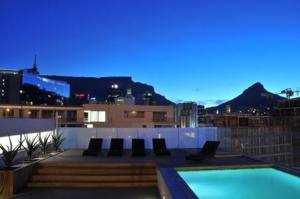 a swimming pool on the roof of a building at 410 Harbour Bridge in Cape Town