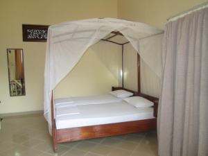 Voodi või voodid majutusasutuse Tandem Guesthouse toas