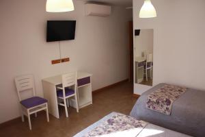 Postel nebo postele na pokoji v ubytování Hostal La Ribera del Júcar