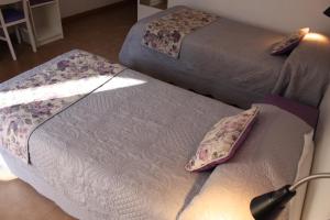 Postel nebo postele na pokoji v ubytování Hostal La Ribera del Júcar