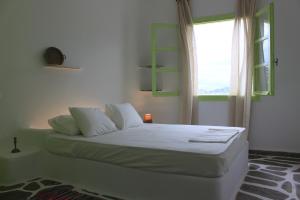 Ένα ή περισσότερα κρεβάτια σε δωμάτιο στο Villa Verde