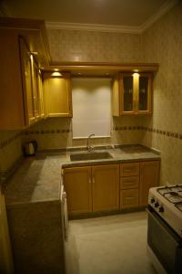 Nhà bếp/bếp nhỏ tại Tyre Boutique Apartments
