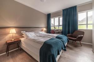 Postel nebo postele na pokoji v ubytování Holt Inn