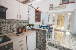 Kuchyň nebo kuchyňský kout v ubytování Studio Apartman Ikarka