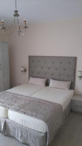 Postel nebo postele na pokoji v ubytování Guest House Adriya