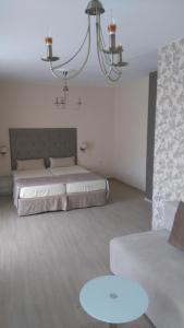 Postel nebo postele na pokoji v ubytování Guest House Adriya