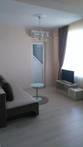 TV a/nebo společenská místnost v ubytování Guest House Adriya