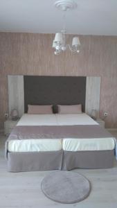 Postel nebo postele na pokoji v ubytování Guest House Adriya