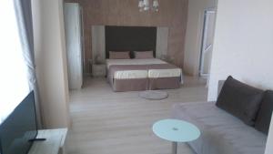 Postel nebo postele na pokoji v ubytování Guest House Adriya