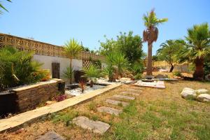 Zahrada ubytování Villa con piscina privada - Benicolada