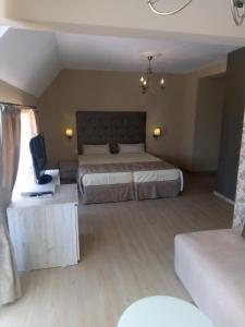 Postel nebo postele na pokoji v ubytování Guest House Adriya