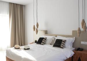 Cama ou camas em um quarto em Mykonos Cactus