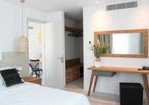 Cama ou camas em um quarto em Mykonos Cactus