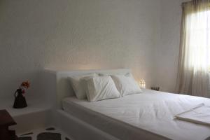 Кровать или кровати в номере Villla Giallo