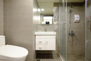 Koupelna v ubytování 意芙旅店 Ifinn Hotel + 37 fotografií