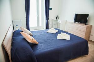 Posteľ alebo postele v izbe v ubytovaní Francesco B&B - Torre Canne