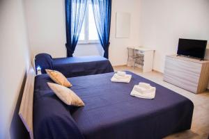 Posteľ alebo postele v izbe v ubytovaní Francesco B&B - Torre Canne