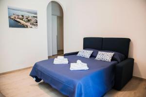 Posteľ alebo postele v izbe v ubytovaní Francesco B&B - Torre Canne