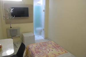 TV a/nebo společenská místnost v ubytování Hotel Calstar
