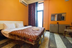 Кровать или кровати в номере hotel amber