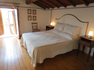 Postel nebo postele na pokoji v ubytování Agriturismo Borgo Del Papa