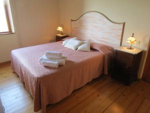 Postel nebo postele na pokoji v ubytování Agriturismo Borgo Del Papa
