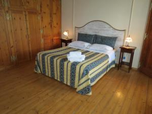 Postel nebo postele na pokoji v ubytování Agriturismo Borgo Del Papa
