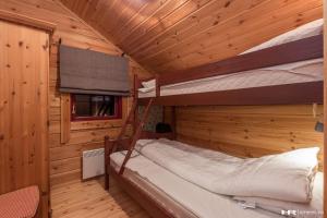 Postel nebo postele na pokoji v ubytování Vrådal Panorama - Tiuråsvegen 39