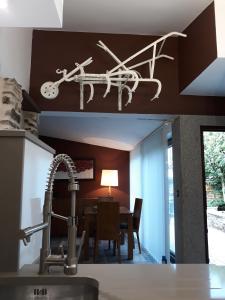 a drawing of a bike on the ceiling of a kitchen at Casa Mara-Pidre in A Coruña