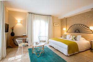 Postel nebo postele na pokoji v ubytování Hôtel La Dimora & Spa